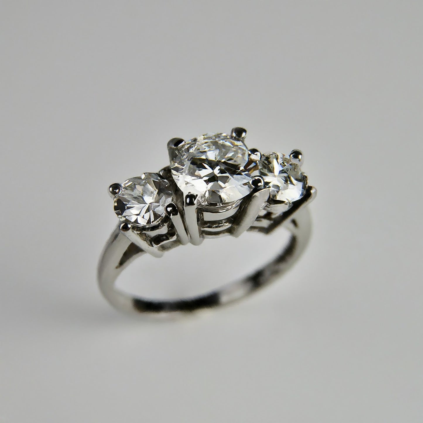 Trilogy Side Stone Diamond Ring