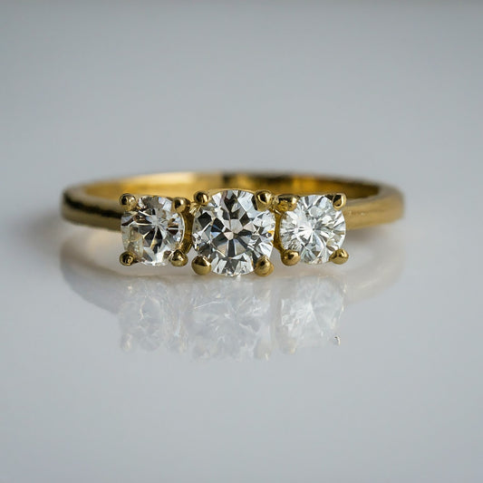 Trilogy Side Stone Diamond Ring